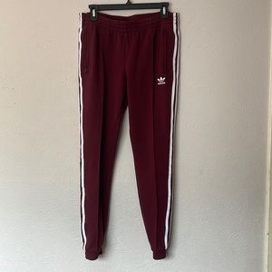 Adida’s maroon joggers (runs large)